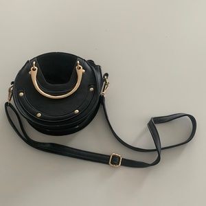 Black studded round purse